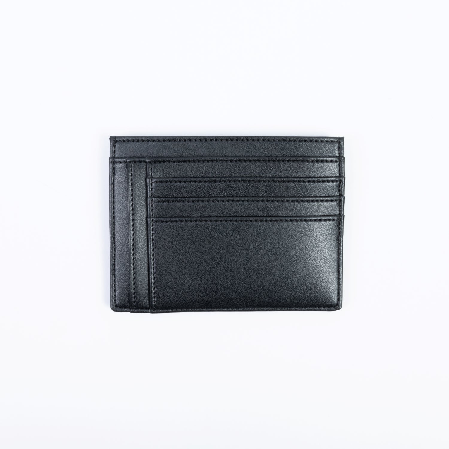 Petit porte-cartes femme en Apple Skin noir, design parisien, durable et cruelty-free.