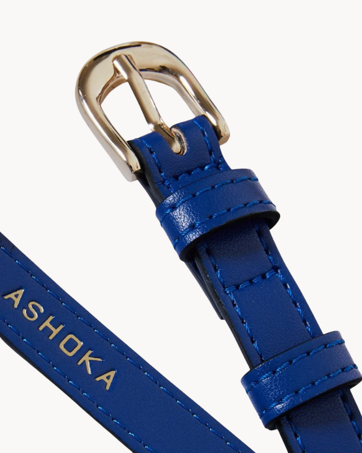 Ceinture femme vegan Uppeal™ bleu électrique, boucle à ardillon en laiton finition or clair